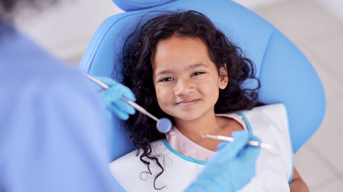 Child undergoing a dental exam