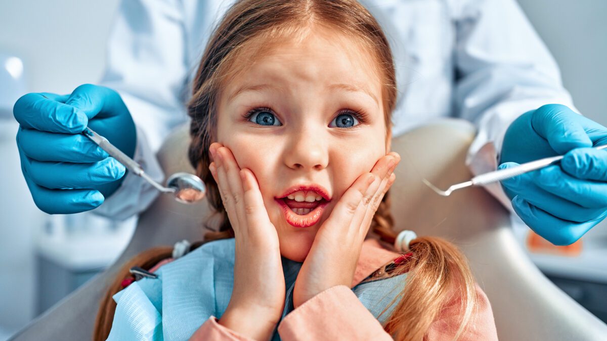 Pediatric dental patient receiving an orthodontic evaluation